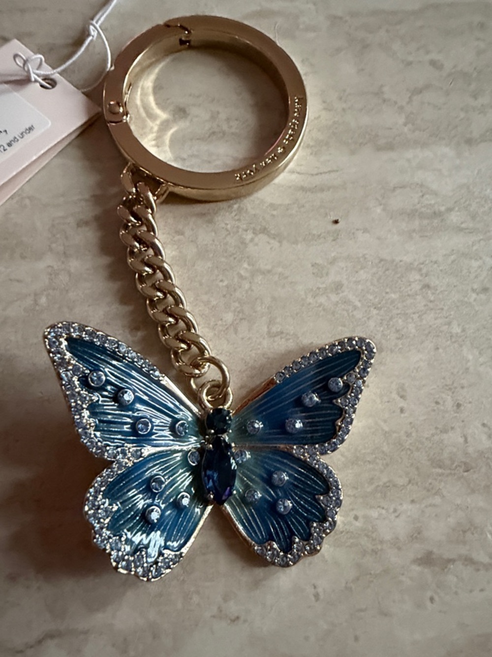 kate spade Gold Keyring with Blue Jeweled Butterfly Charm - Picture 2 of 3